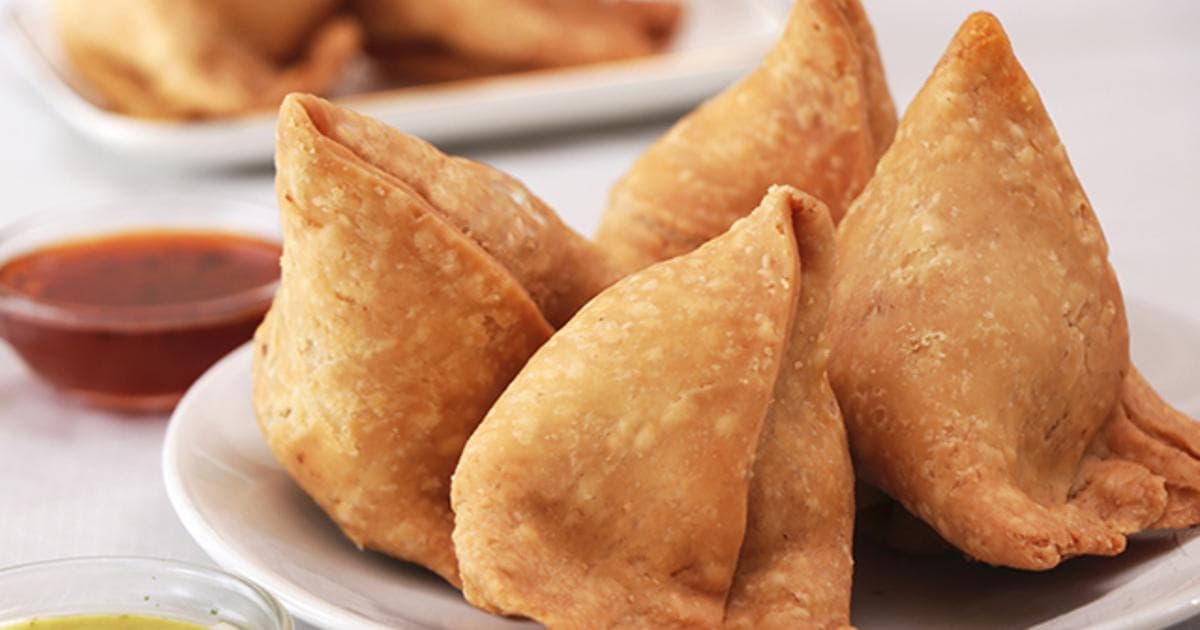 Freshly fried samosas ready for collection